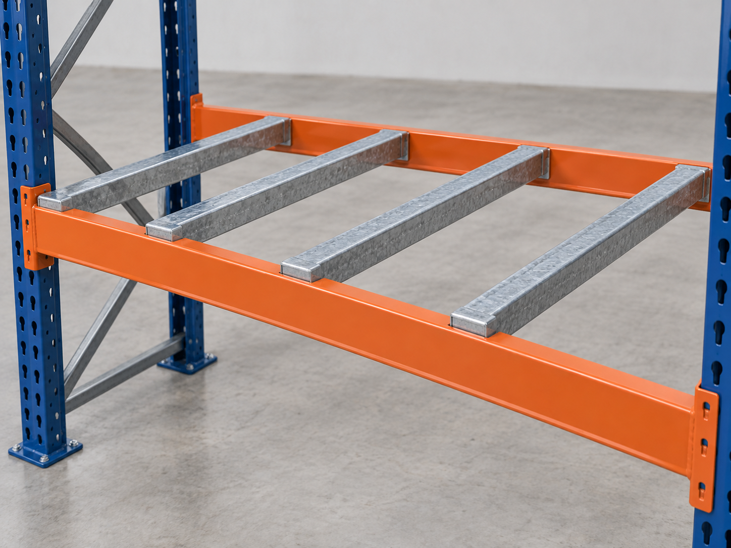 Galvanized pallet support bars spanning between rack beams